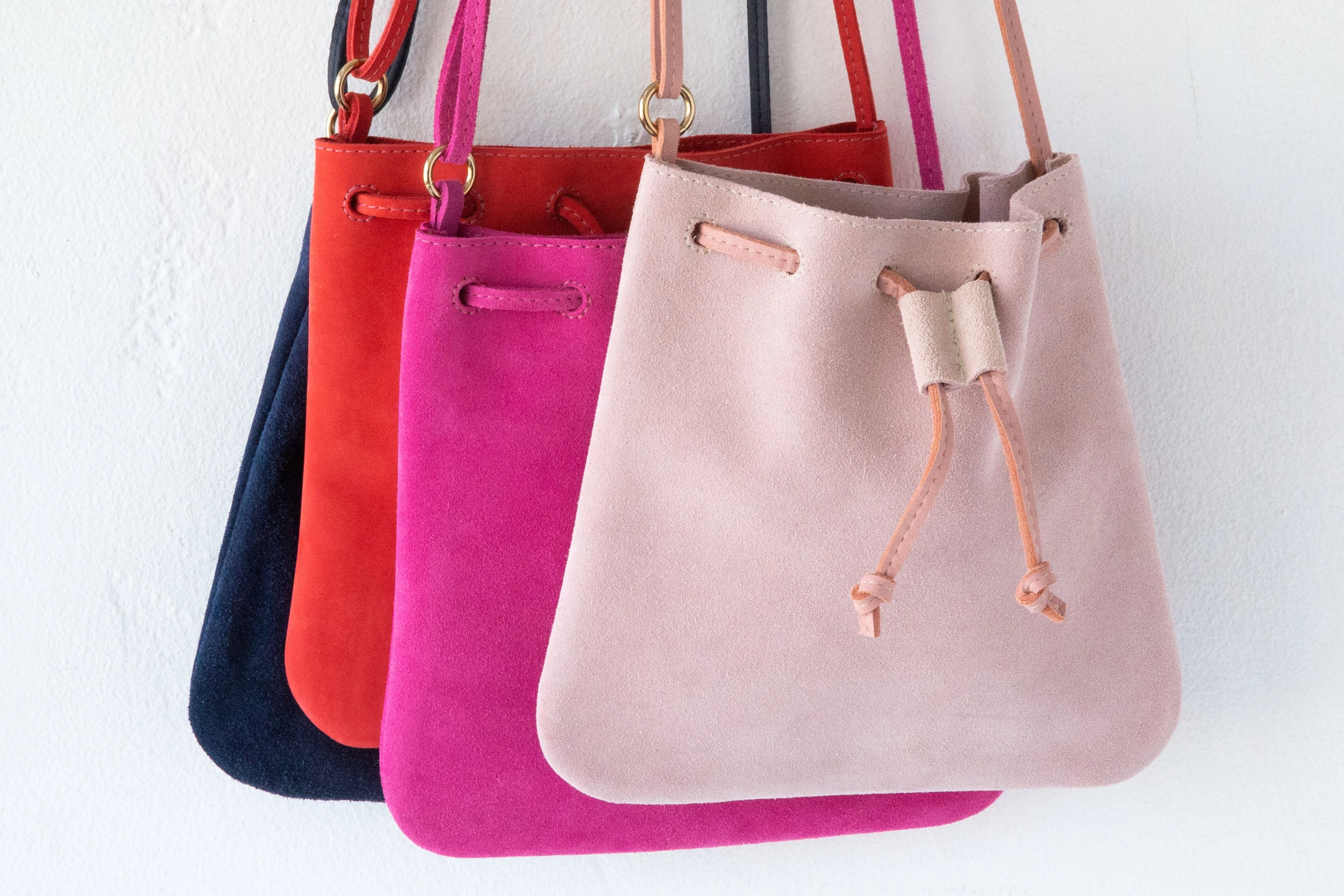 d/e goods small petal suede cross body bag