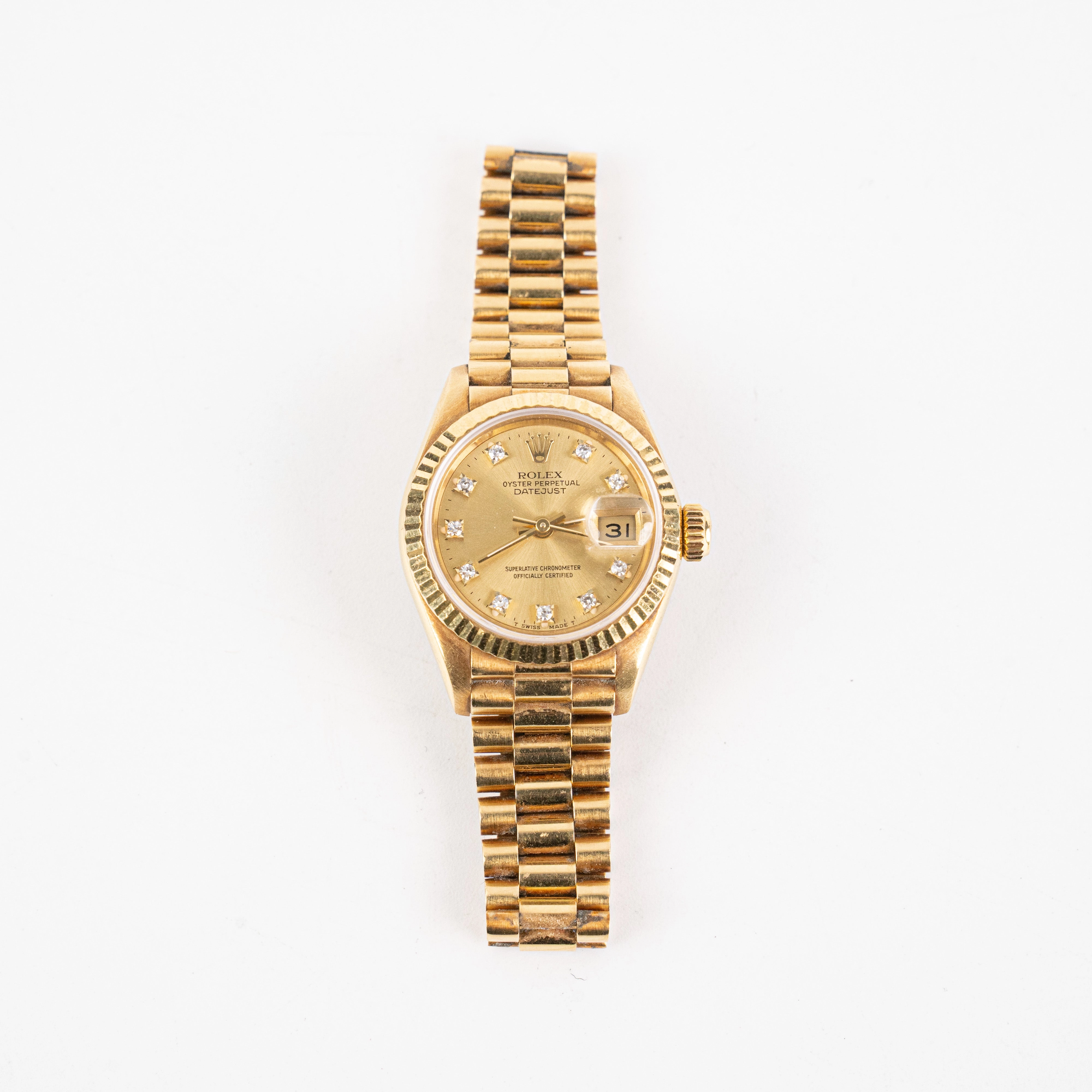 Rolex 26mm Gold with Diamond Watch