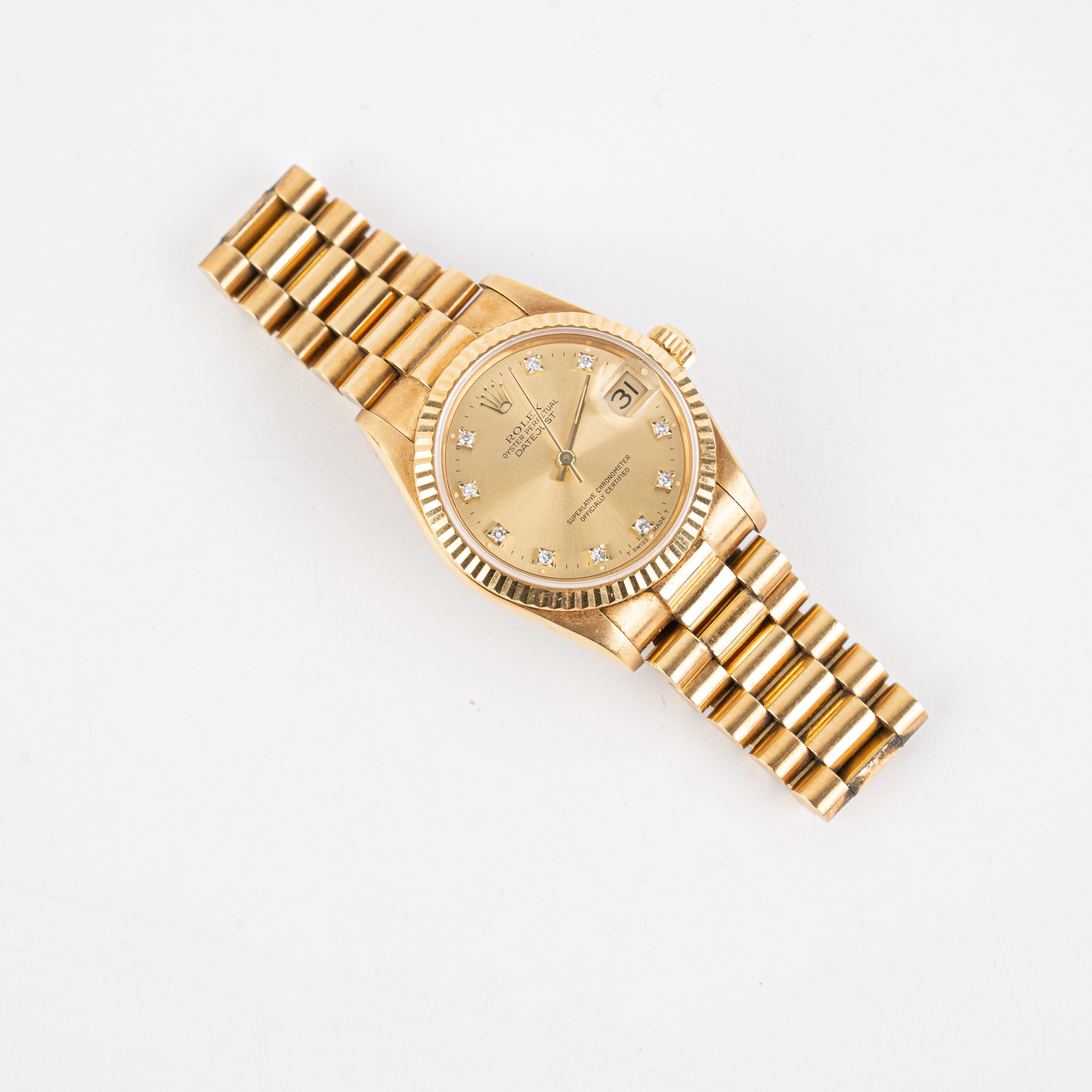 Rolex 31mm Gold with Diamonds Watch