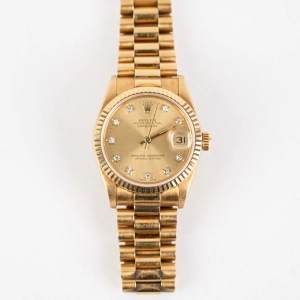 Rolex 31mm Gold with Diamonds Watch